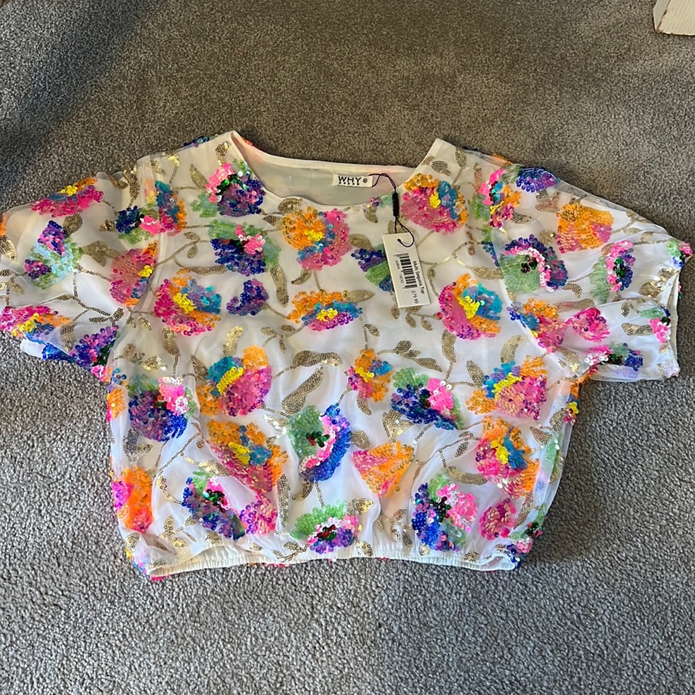 Sequin top and matching shorts outfit.